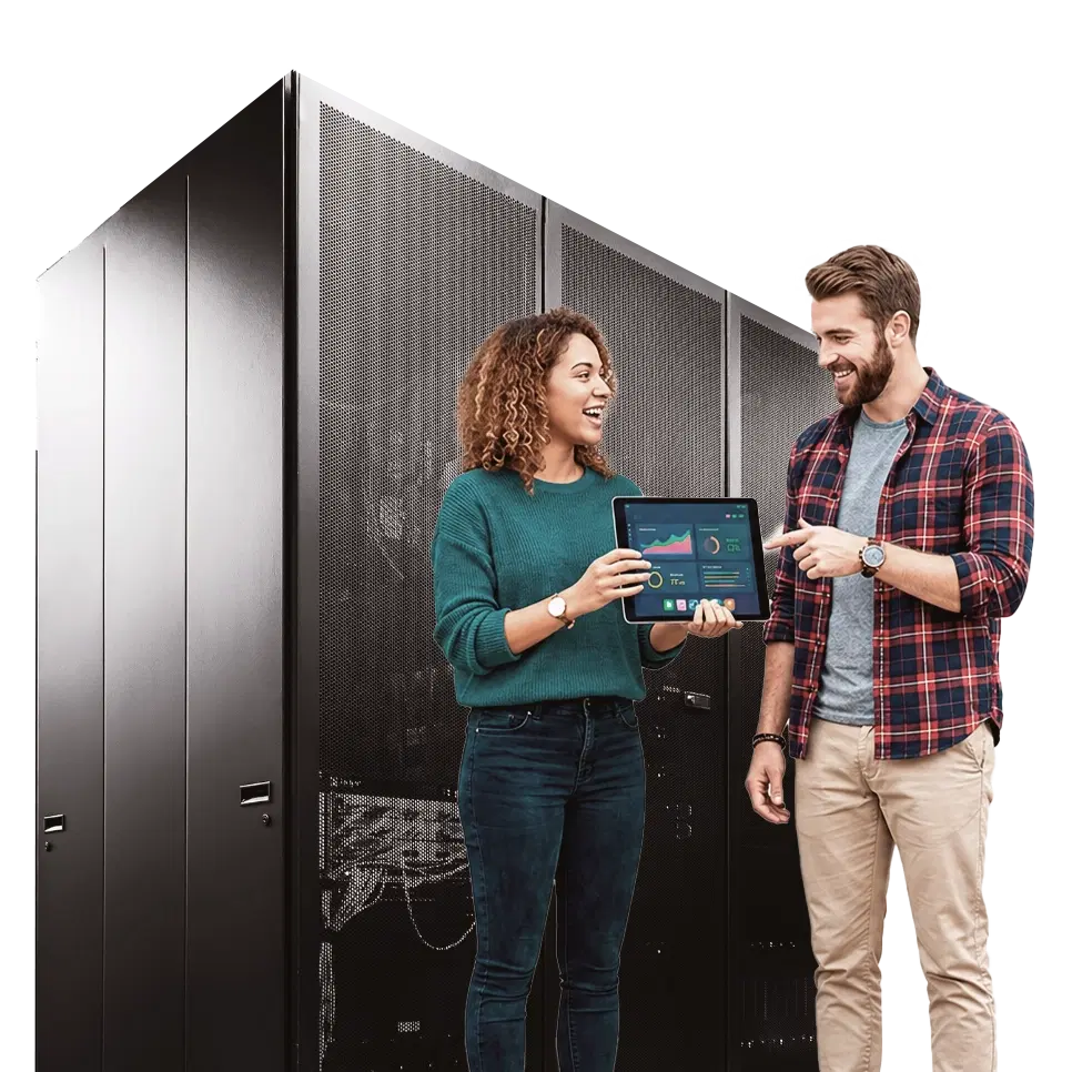 IT engineers reviewing infrastructure dashboard in a data center